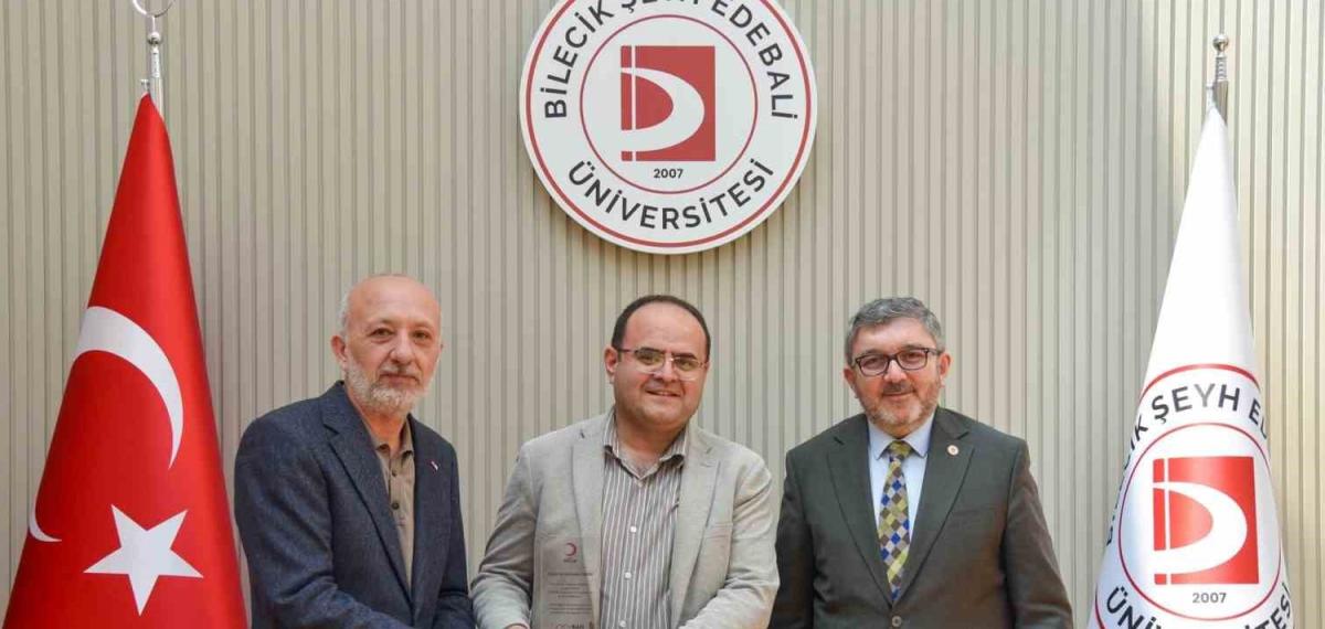 Bşeü’ye Gümüş Madalya ve Madalya Beratı Takdimi