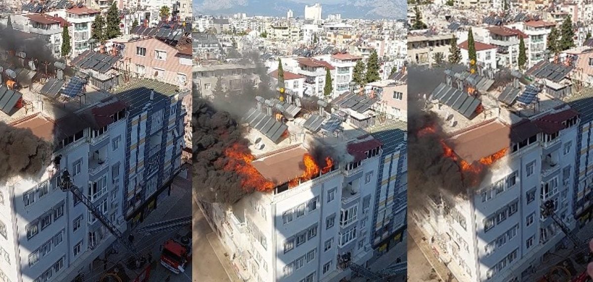 Teras kattaki yangında pencerede bekleyen 2 kişi itfaiye tarafından kurtarıldı