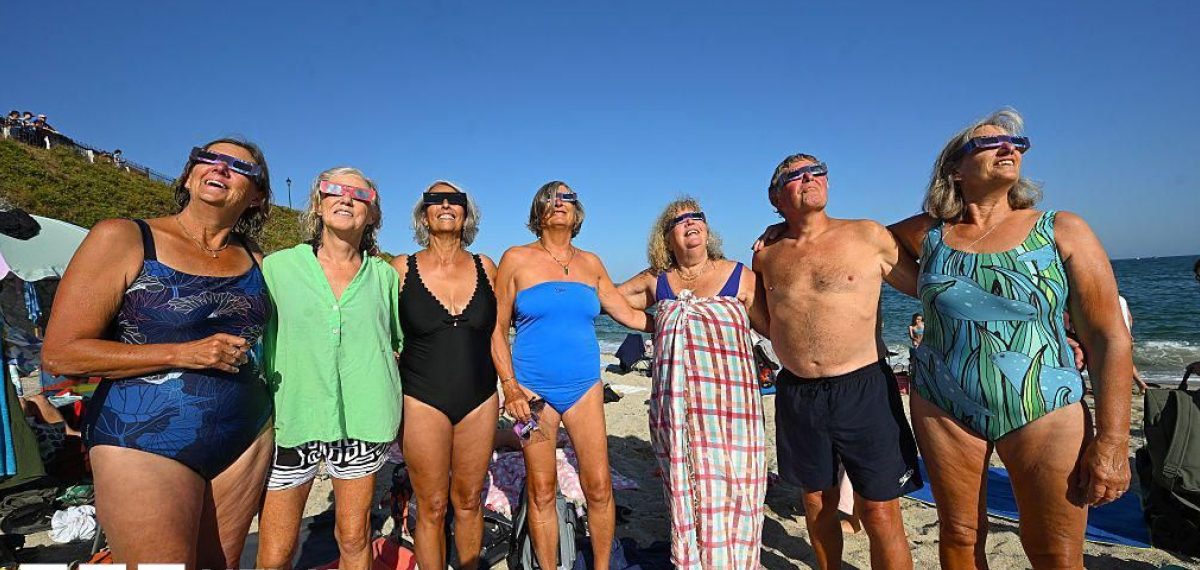 Partial solar eclipse darkens South West and Channel Islands as thousands gather