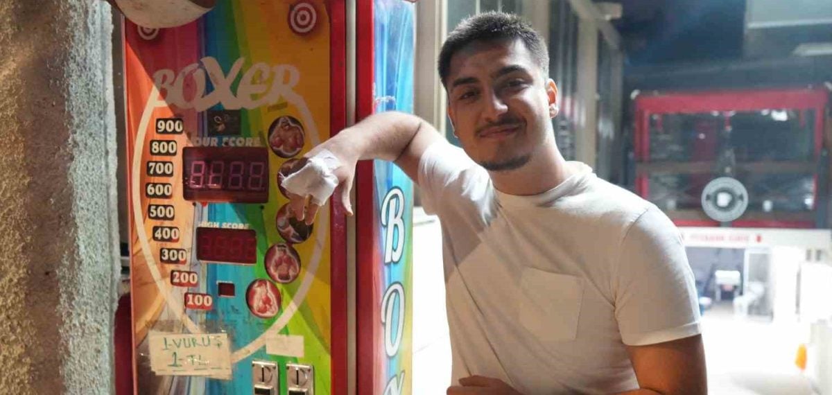 Boks makinesini ıskalayınca kafenin tırtıklı duvarını yumrukladı