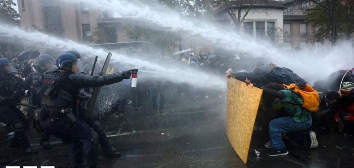 Tear gas and water cannon used as French protests turn violent across cities